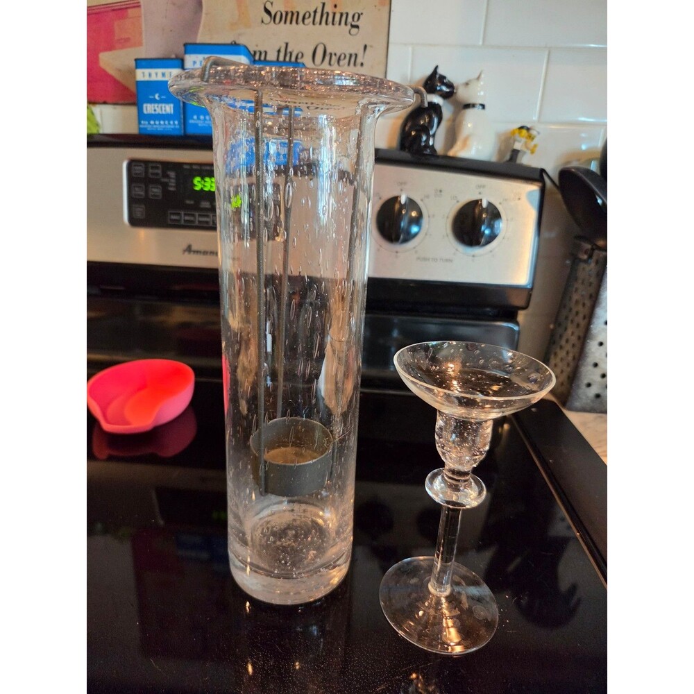 Two glass candle holders